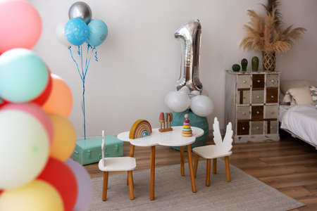 A photo zone for a birthday boy in 1 year with balloonsの写真素材