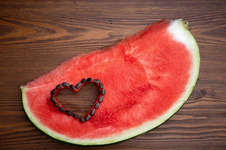 An appetizing piece with red flesh and dark bones.Banner with copyspaceの写真素材