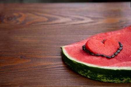 An appetizing piece with red flesh and dark bones.Banner with copyspaceの写真素材