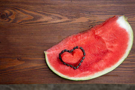An appetizing piece with red flesh and dark bones.Banner with copyspaceの写真素材