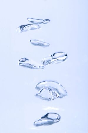 Bubbles rising on a surfaceの写真素材