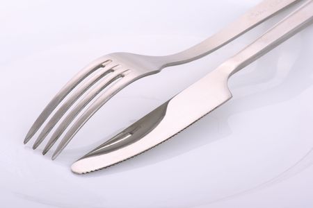 Knife and plug on a plate