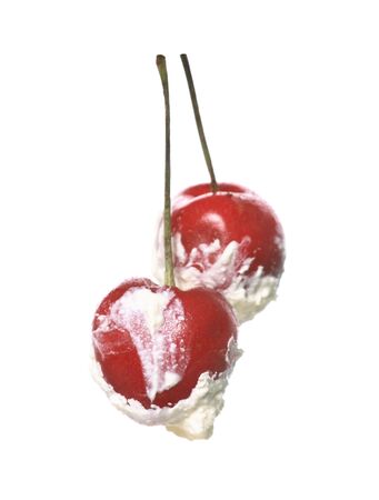cream, cherries on a white backgroundの写真素材