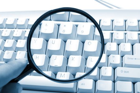 Magnifying glass, button, key