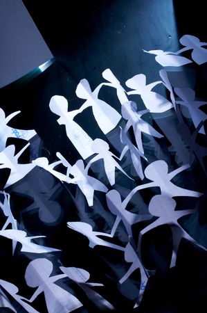 Crowd of paper people keeping for hands