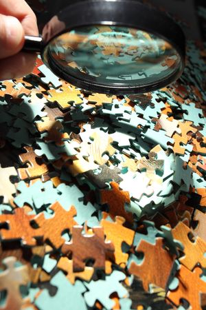Magnifying glass, puzzleの写真素材