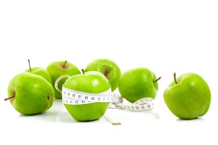 Green apples measured  the meter, sports applesの写真素材