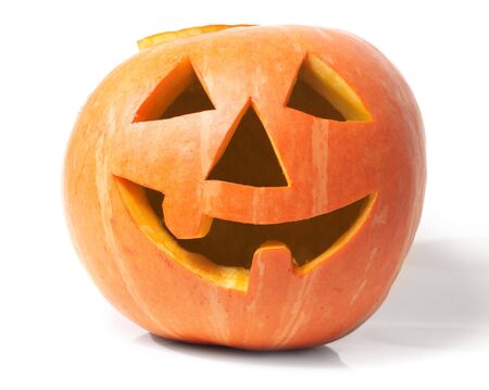 Creepy carved pumpkin face, with a smileの写真素材