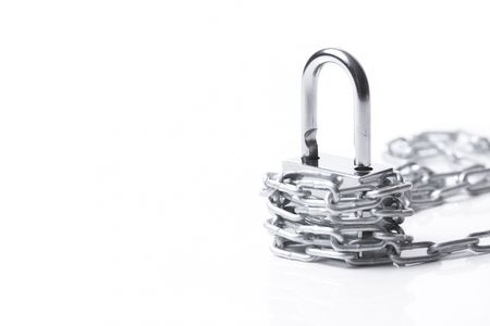   Lock and chain  on the white backgroundの写真素材