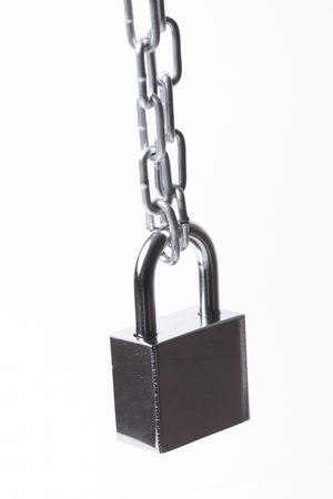   Lock and chain  on the white backgroundの写真素材