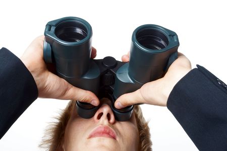 The man with the field-glass looking in beforeの写真素材