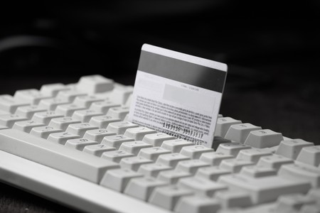 creditcard ready for payment on the keyboardの写真素材