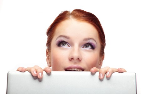 Portrait of happy  business woman with a laptop.の写真素材