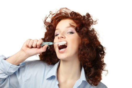 Young beauty woman clean teethの写真素材