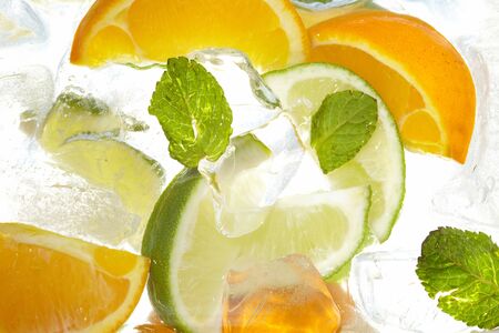 leaf mint and cut citrus in ice  の写真素材