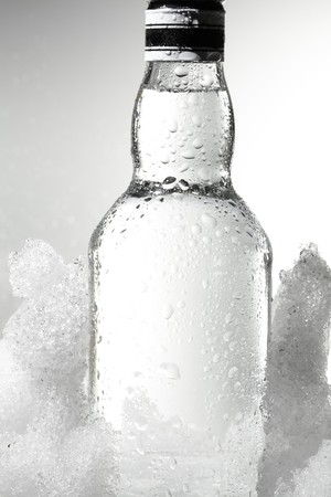 Close up view of the bottle in iceの写真素材