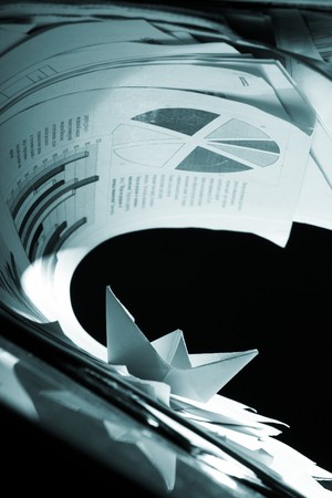 Business concept, paper boat and tsunami documentsの写真素材