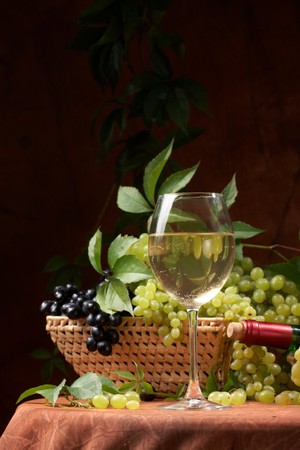 White dry wine, fresh clusters of a grapesの写真素材