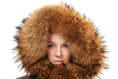   Beautiful woman in winter fur coatの写真素材
