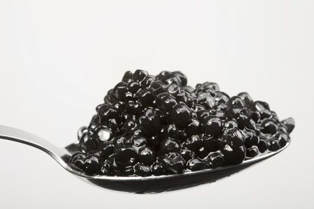 The full spoon of black caviarの写真素材