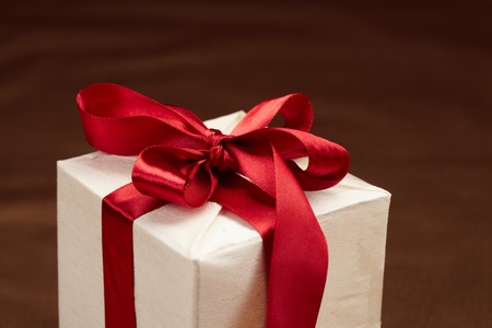  Beautiful gift box on the gold background