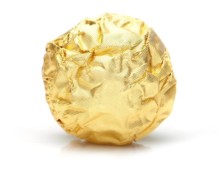 candy in golden foil の写真素材