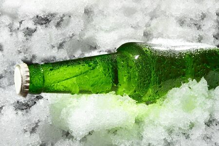 Close up view of the bottle in iceの写真素材