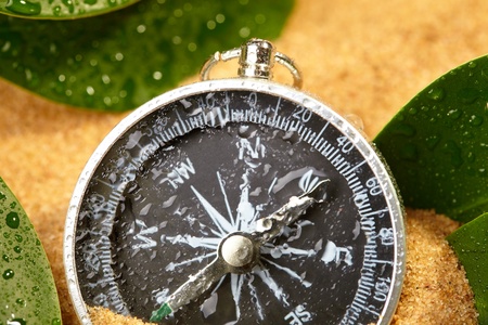 wet compass in sandの写真素材