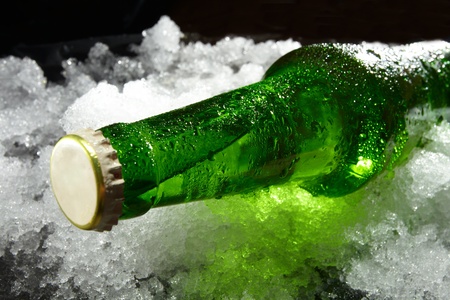 Close up view of the bottle in iceの写真素材