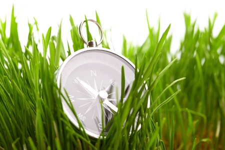 compass in green grassの写真素材