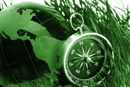  compass in green grassの写真素材