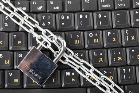  laptop keyboard secured with chain and padlock