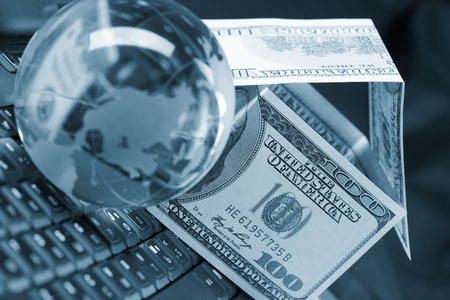 dollars on the keyboardの写真素材