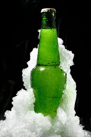 Close up view of the bottle in iceの写真素材
