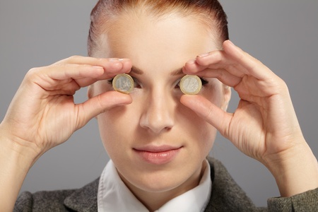 portrait of pretty businesswoman with moneyの写真素材