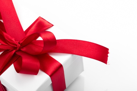 Gift decorated with a tape and a bow