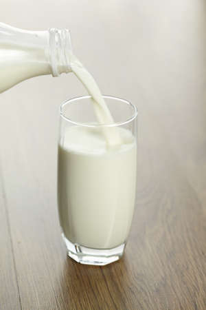 milk bottle and glass の写真素材