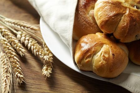 baked bread on wood table 