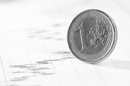 Business diagram on financial report with coins の写真素材