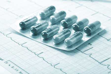 pills on the cardiogram