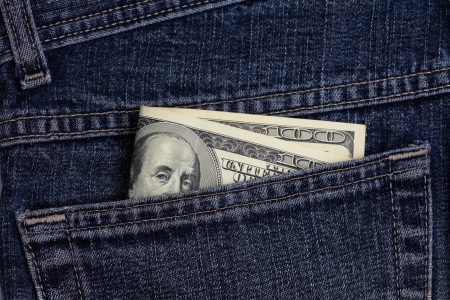 dollars in a jeans pocket の写真素材