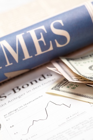 Financial newspaper with paperの写真素材
