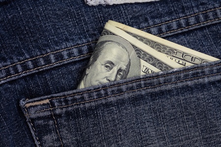 dollars in a jeans pocket の写真素材