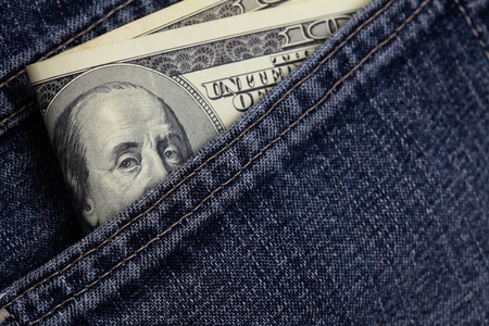 dollars in a jeans pocket の写真素材