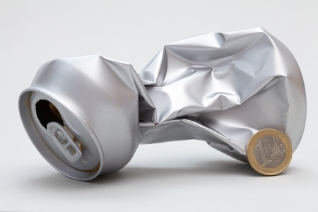 Crushed Aluminum Can with coins