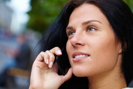 Woman with mobile phoneの写真素材