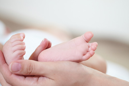 baby's feetの写真素材