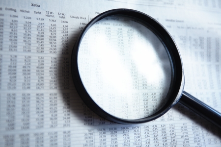 Magnifying glass on the documentの写真素材