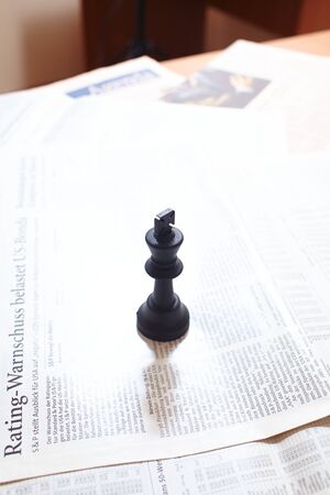 Chess piece on the document