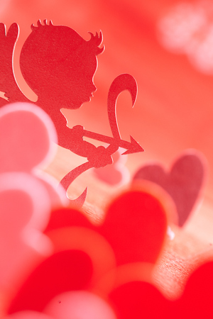 Hearts on red backgroundの写真素材